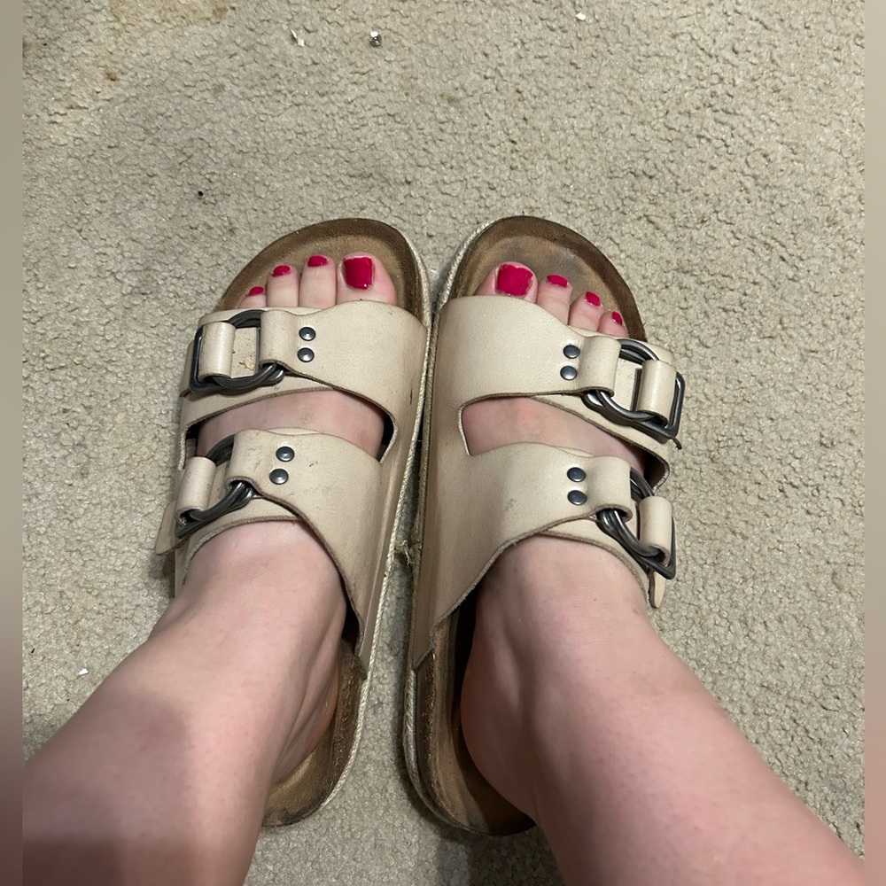 Women’s well worn Birkenstock shoes